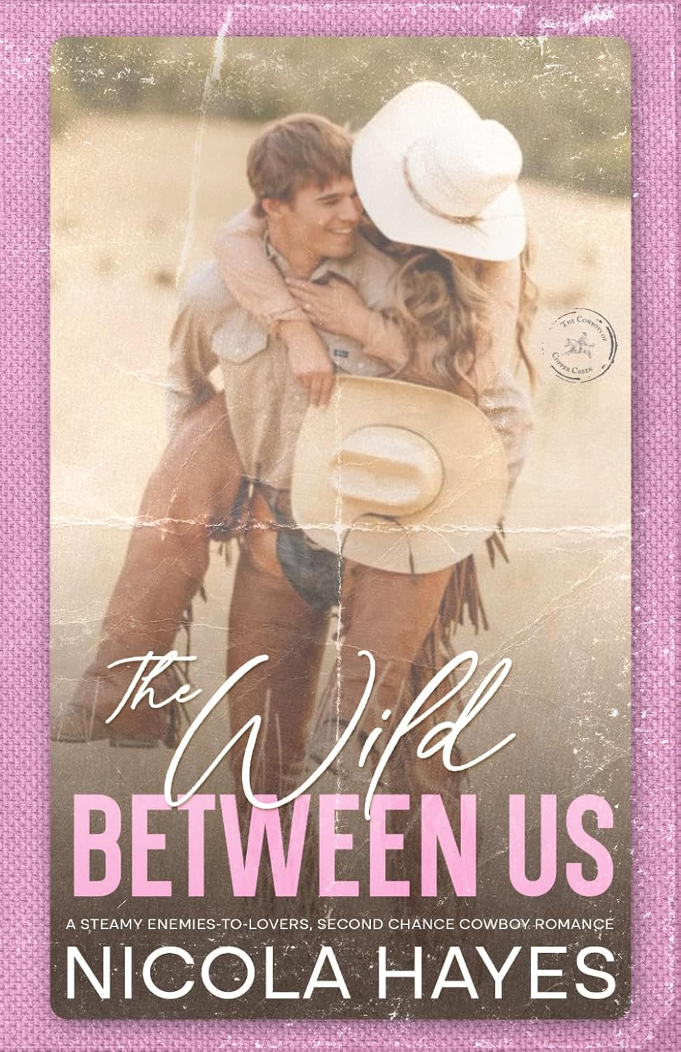 The Wild Between Us: A Steamy Enemies to Lovers Second Chance Cowboy Romance (Cowboys of Copper Creek)